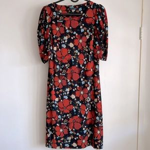 TOMMY H Floral Round-Neck Puff-Sleeve dress in navy blue with orange flowers. 4